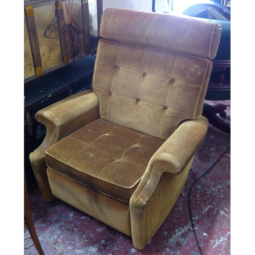 450 - A vintage Parker Knoll reclining armchair with gold velvet upholstery.