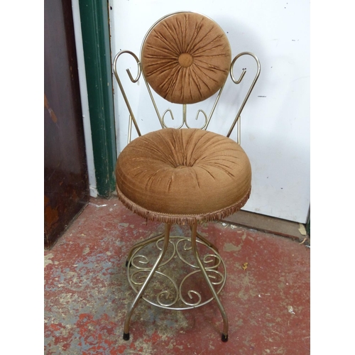 454 - A vintage metal framed velvet upholstery bedroom chair.