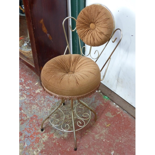 454 - A vintage metal framed velvet upholstery bedroom chair.