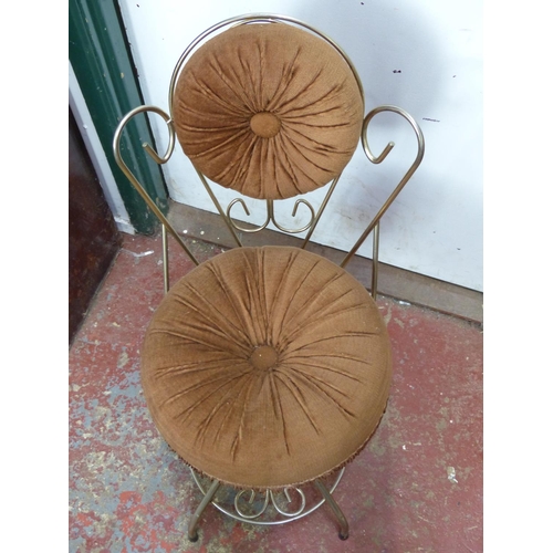 454 - A vintage metal framed velvet upholstery bedroom chair.