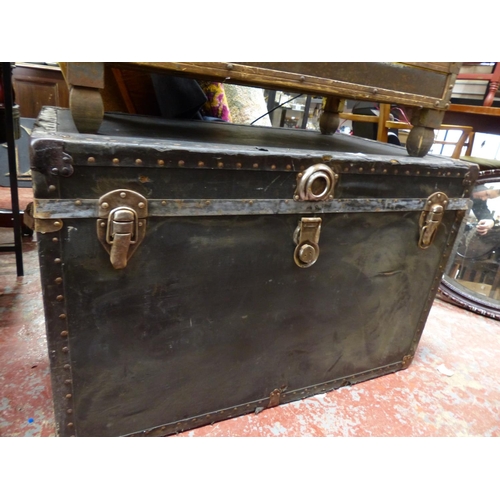 460 - A large antique/ vintage travel trunk, measuring