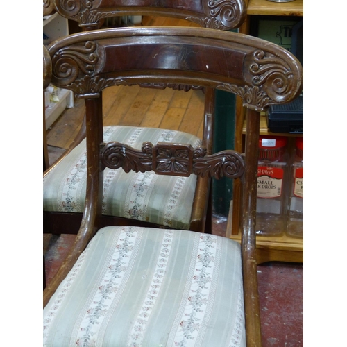 473 - Four antique style dining room chairs with upholstery.