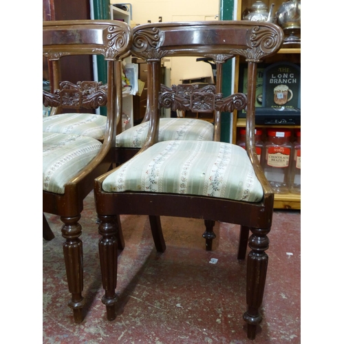 473 - Four antique style dining room chairs with upholstery.