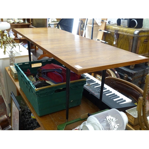 477 - A vintage rosewood coffee table, measuring 134cm x 46.5cm x 50cm.