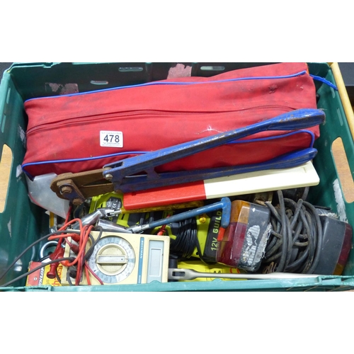 478 - An assortment of tools, a cased tow rope and jump lead set and lots more.