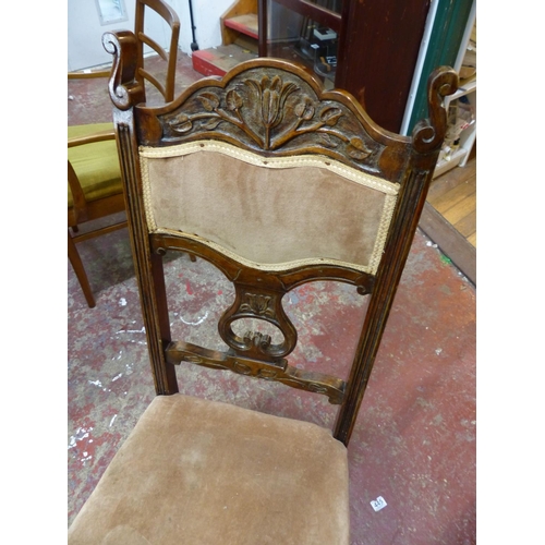 482 - An antique carved occasional chair.