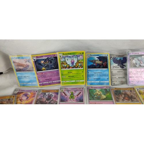 202 - A collection of rare holo / reverse holo Pokemon cards all in protective sleeves.