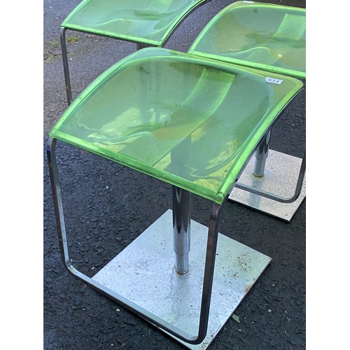 434 - A set of four rare vintage transparent fluorescent green bar stools by Italian designer Pedrali.