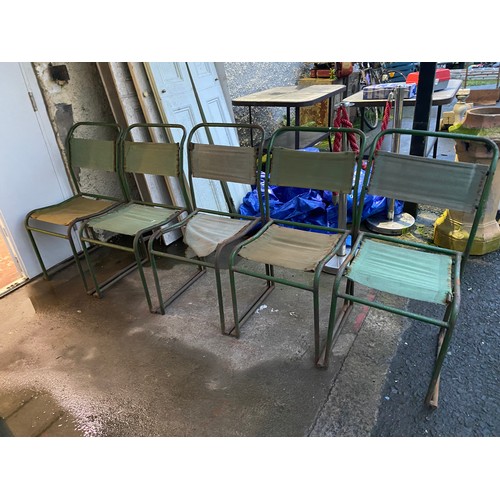 435 - Five vintage metal framed stacking chairs with fabric seats