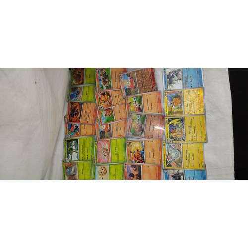 205 - A collection of Paldea Evolved Pokemon cards and more.