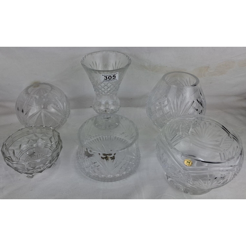 305 - A collection of vintage cut glass & Tyrone crystal vases, tallest measuring 18cm tall.