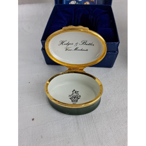 314 - A collection of Halcyon Days and Crummles enamel trinket boxes.