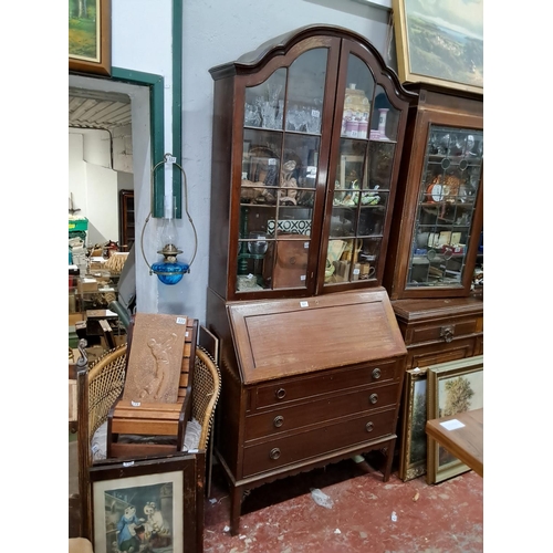 321 - An antique library bookcase / bureau. (In need of restoration).