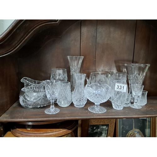 331 - A large assortment of cut-glass and crystal items to include Tyrone crystal and more.