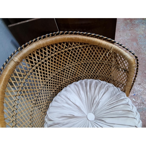 335 - A vintage wicker and rattan chair.