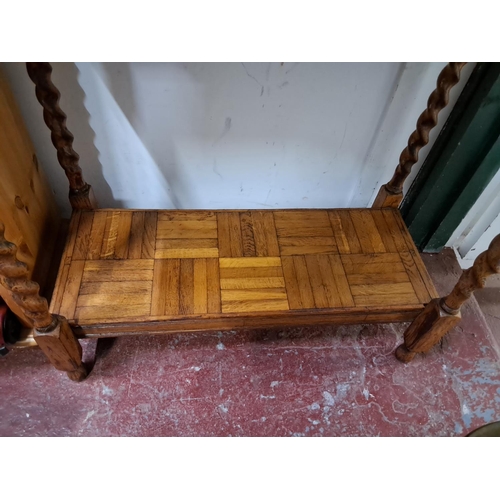 355 - A stunning inlaid side table with barely twist supports.