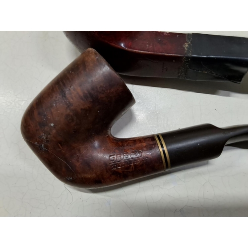 369 - A Peterson Irish pipe, a  Gabry pipe and a table lighter, presented by Benson and Hedges for the his... 