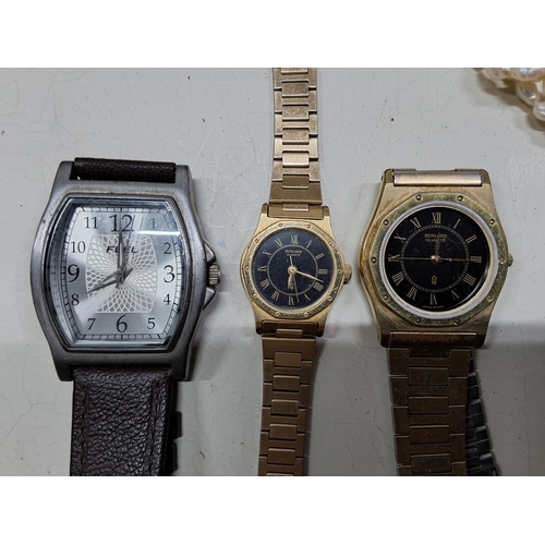 395 - An assortment of vintage costume jewellery, watches and more.