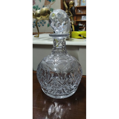 374 - A stunning vintage crystal decanter and an assortment of cut glass glasses.