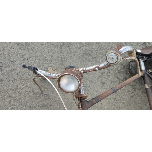 461 - A vintage bicycle with original bike lamp, bell, brooks seat and more.