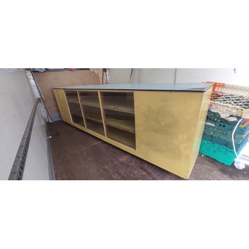 278 - A large vintage shop counter, measuring 305cm x 85cm x 61cm.