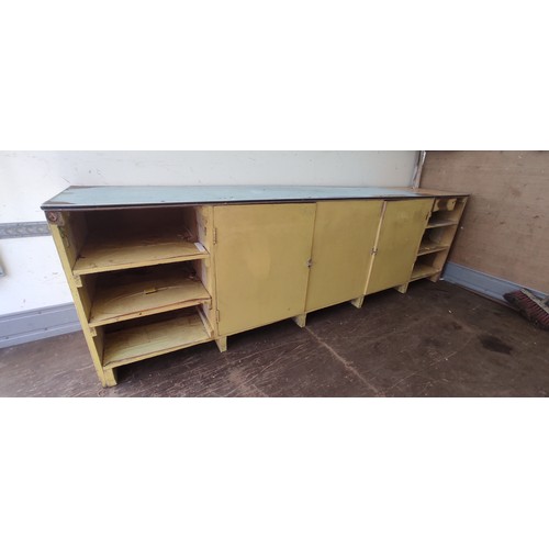 278 - A large vintage shop counter, measuring 305cm x 85cm x 61cm.