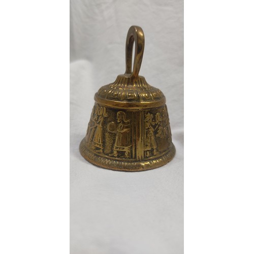 32 - A collection of various vintage/ antique brass bells. Including a sanctuary / Sanctus bell, depictin... 