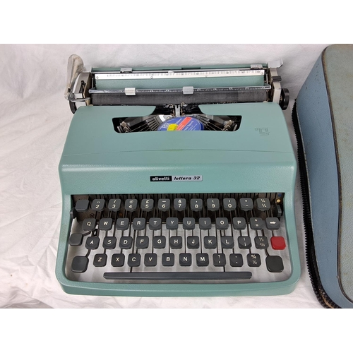 10 - A portable Olivetti Lettera 32 typewriter and original carry case.