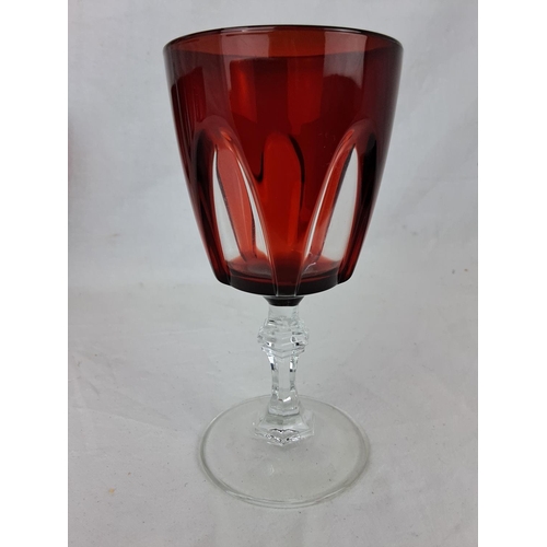 31 - A set of 9 Gothic Luminarc Durand ruby red stemmed glasses.