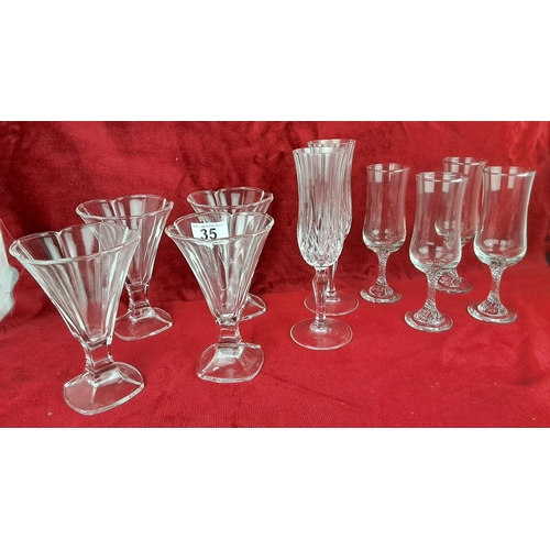 35 - A large assortment of vintage glassware.