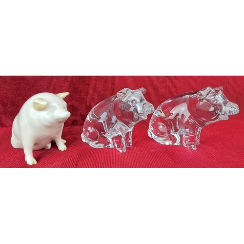 38 - A Belleek pig and two Cristal Au Plomb pigs by Pets.