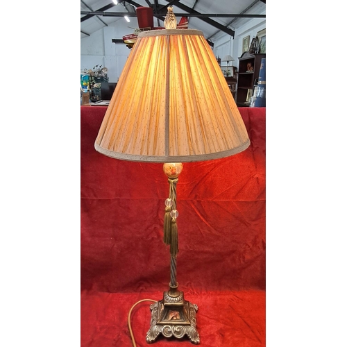 39 - An Art Deco style table lamp. Measuring 90cm Tall