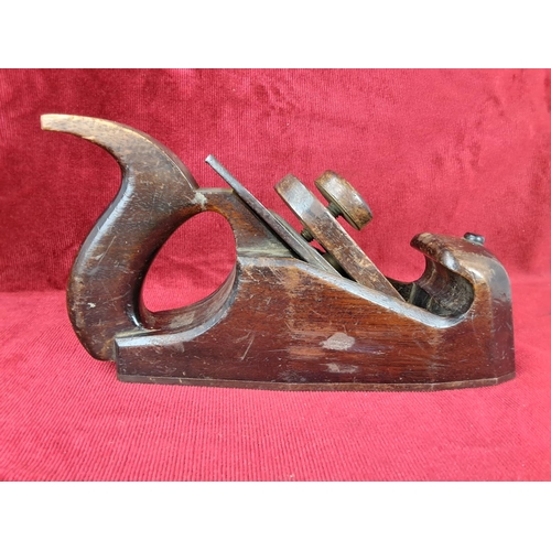 42 - An antique woodworking smoothing plane.