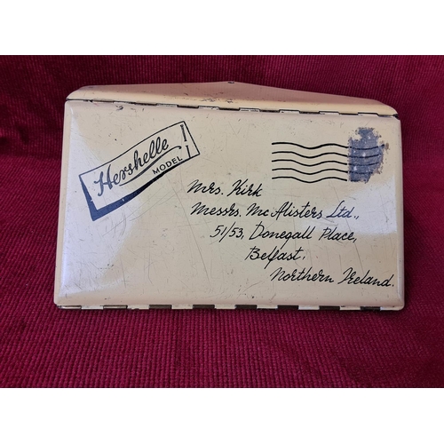 46 - A vintage cigarette case in the form of an envelope, by Hershelle.