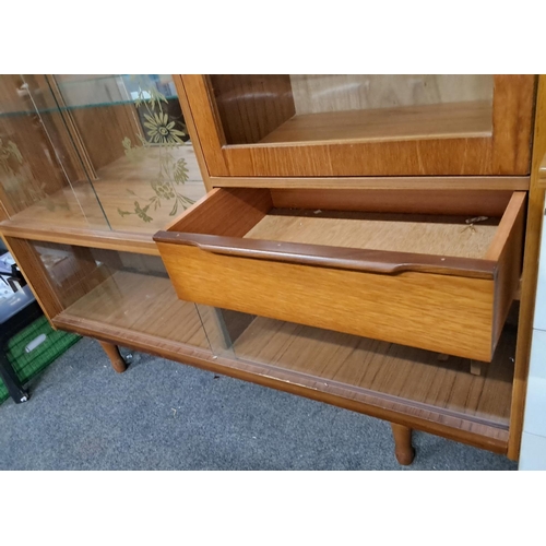 47 - A vintage/ Mid-Century display cabinet. Measuring 122 L x 30 W x 118 H