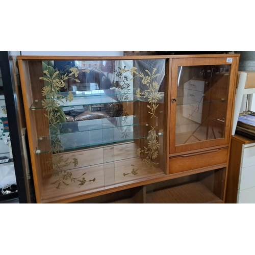 47 - A vintage/ Mid-Century display cabinet. Measuring 122 L x 30 W x 118 H