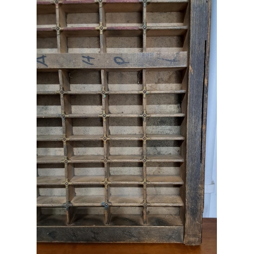 48 - An antique printers type tray. Measuring 83 cm x 37 cm