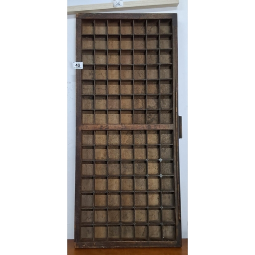 49 - An antique printers type tray. Measuring 82 cm x 37 cm