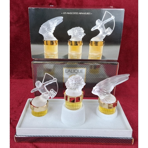 58 - A stunning Lalique Flacons Collection 'Les Mascottes' POur Homme perfume set.