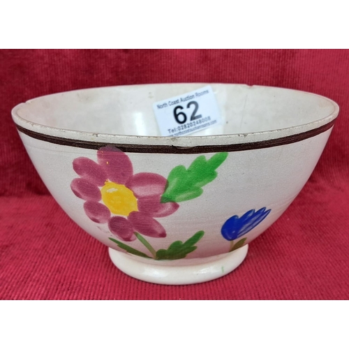 62 - A stunning Irish spongeware bowl with floral scenes. Measuring 14cm in diameter.