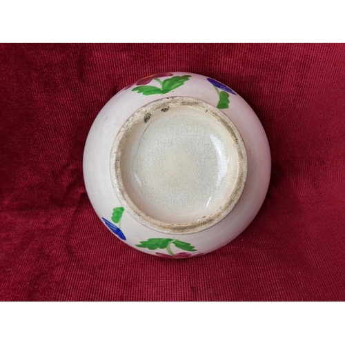 62 - A stunning Irish spongeware bowl with floral scenes. Measuring 14cm in diameter.