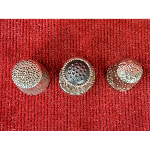 74 - An antique Charles Horner Dorcas thimble and two others.