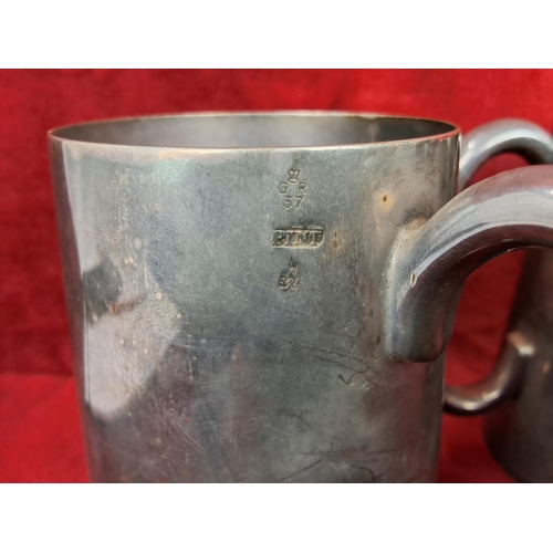 79 - Three heavy silver plated tankards with crests.