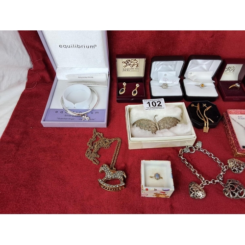 102 - A large assortment of vintage costume jewellery.