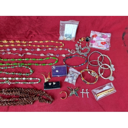 110 - A large assortment of vintage costume jewellery.