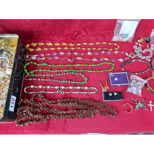 110 - A large assortment of vintage costume jewellery.