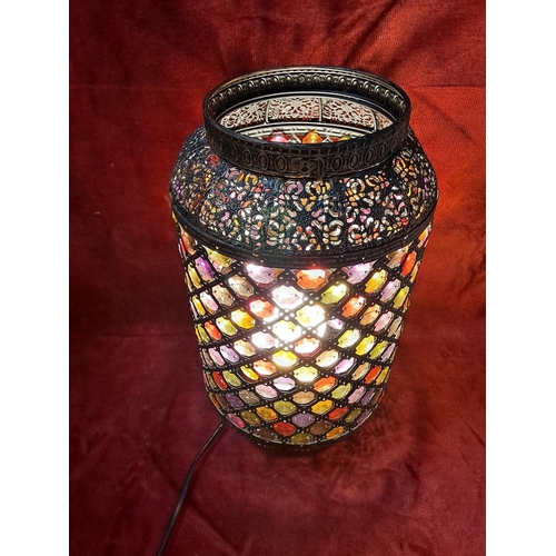 134 - A Moroccan style table lamp. Measuring 35cm tall.