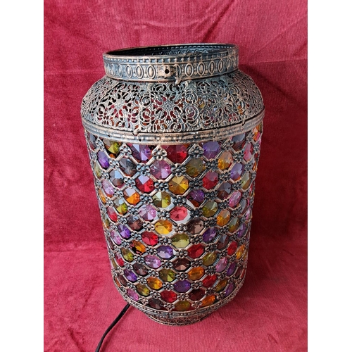 134 - A Moroccan style table lamp. Measuring 35cm tall.