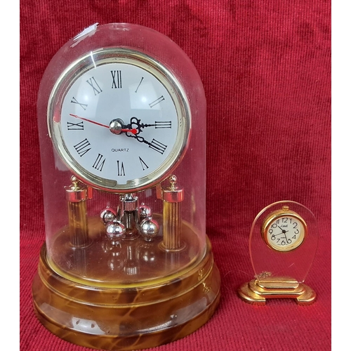 155 - An Anniversary clock with plastic dome and a miniature Linel clock.