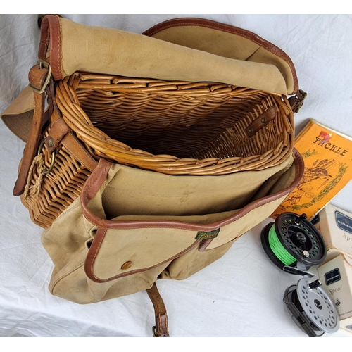 176 - A Brady Halesowen fishing bag and contents to include, a Jaxon mega fly 9/11 reel, The Viscount 150 ... 